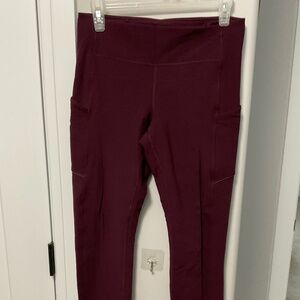 Lululemon leggings, burgundy , size 8 , like new. side leg pockets
